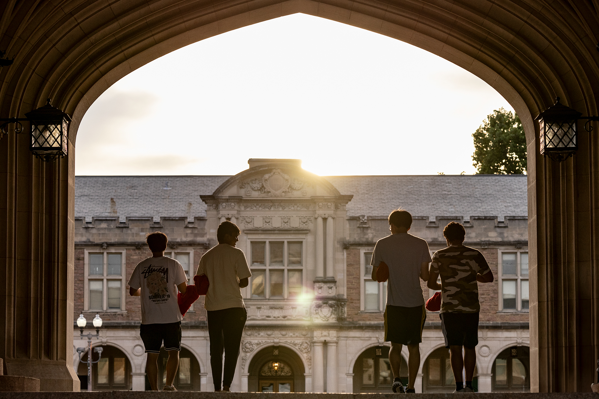 four students under archway at Brookings