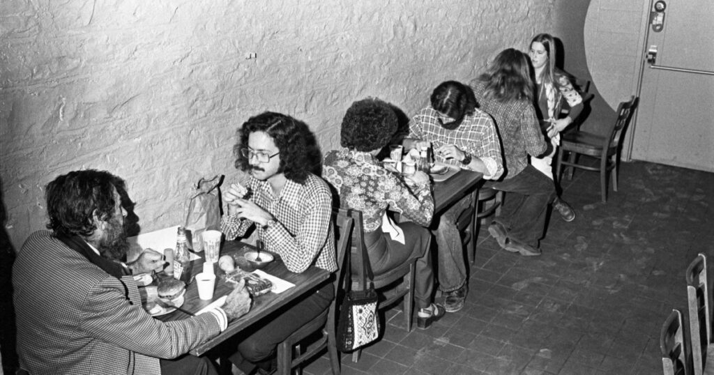 Students having dinner at The Rat in the 1970s