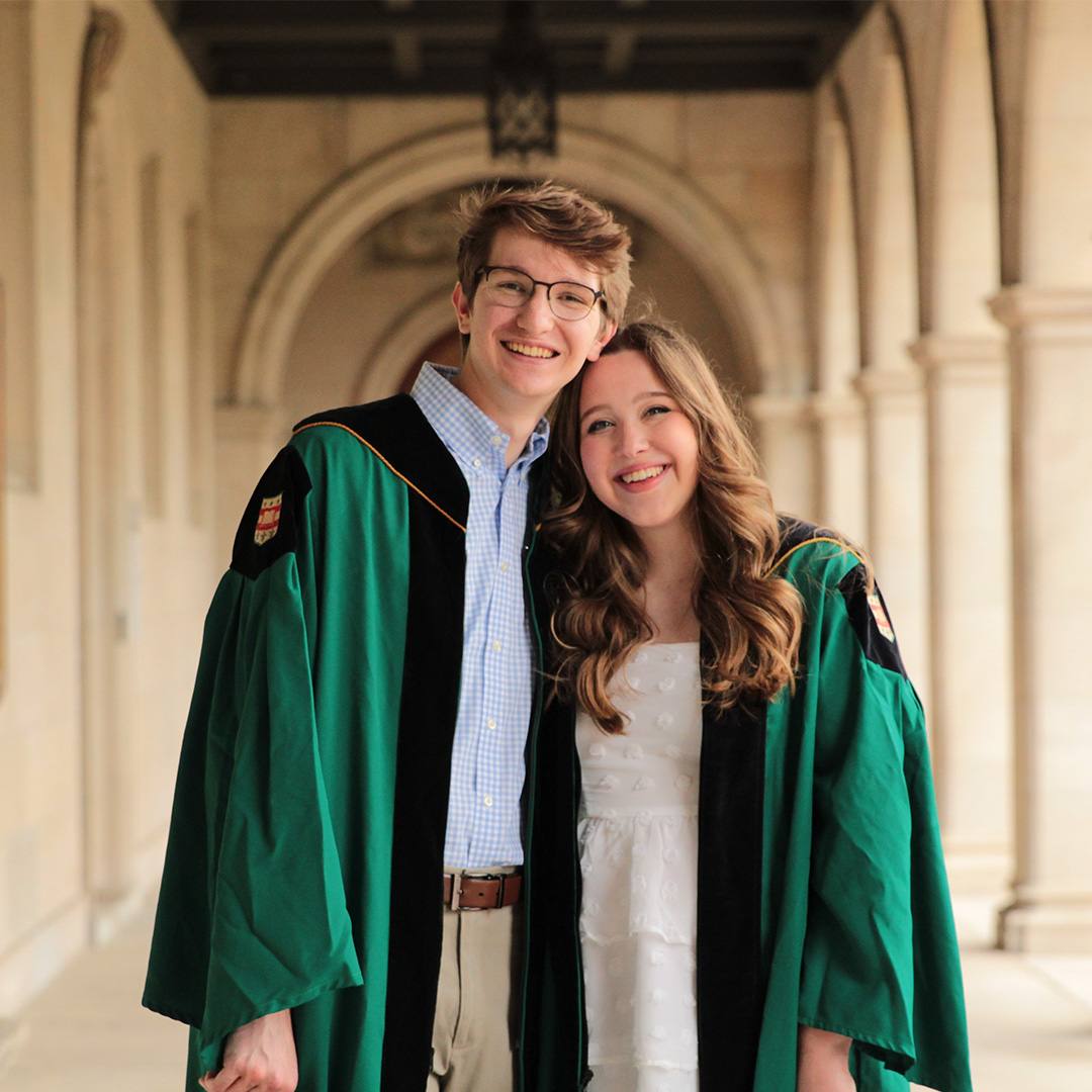 Thomas and Chloe in the Ridgley Hall arcade during their WashU Commencement