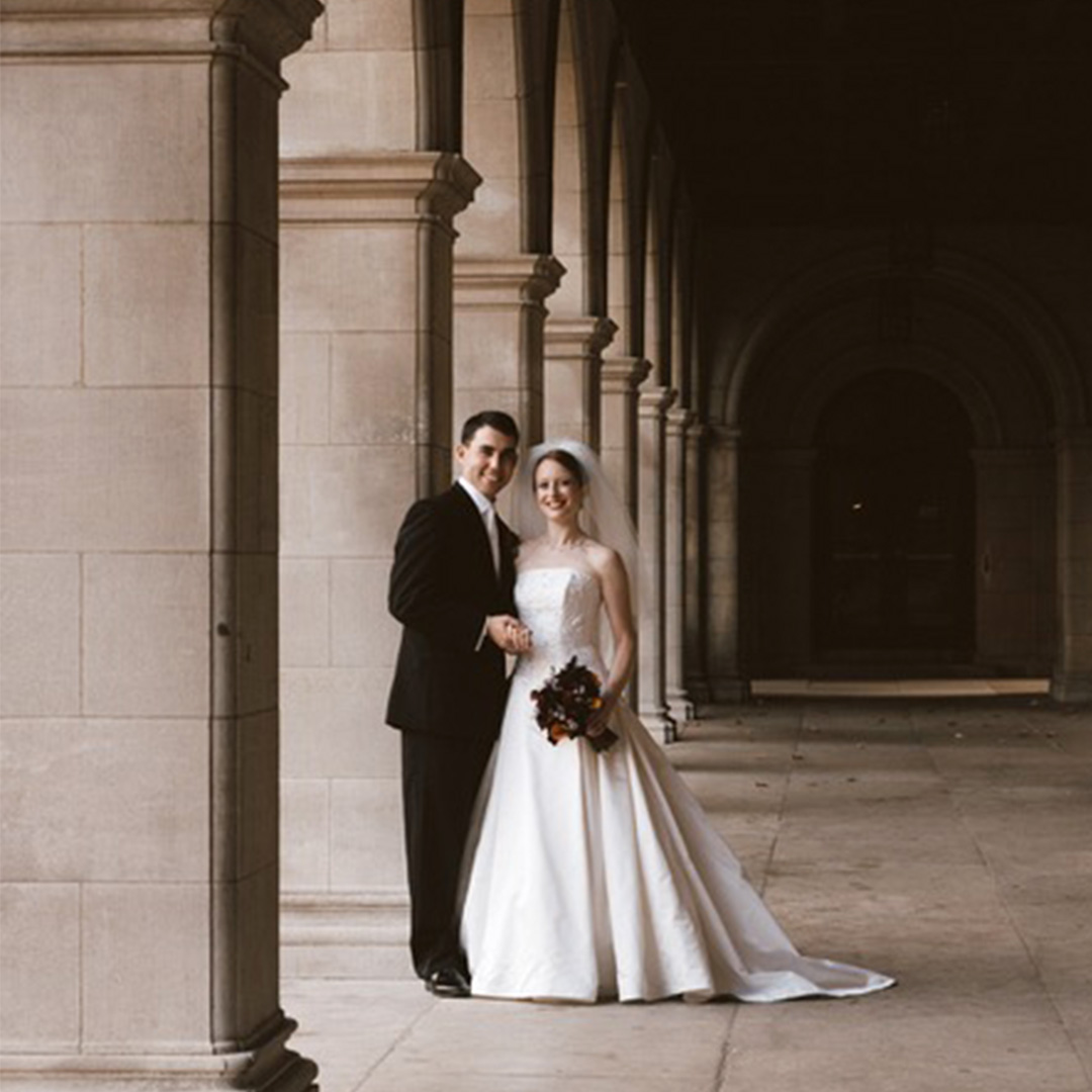 Matthew and Jill's wedding photo in the WashU Quad in front of Brookings Hall