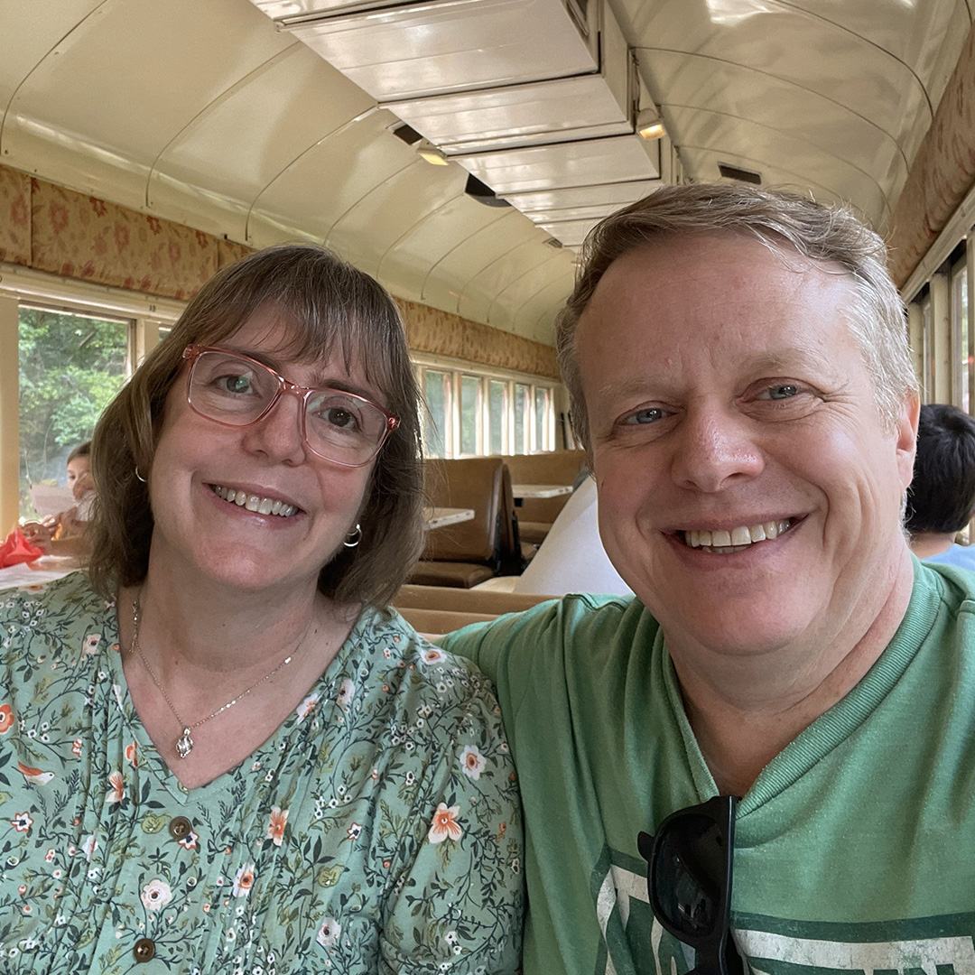 Recent photo of Tamara and Gary riding a train
