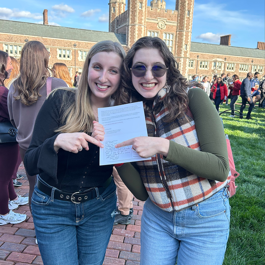 Rachel and Shelby pictured at their senior class toast in the WashU Quad