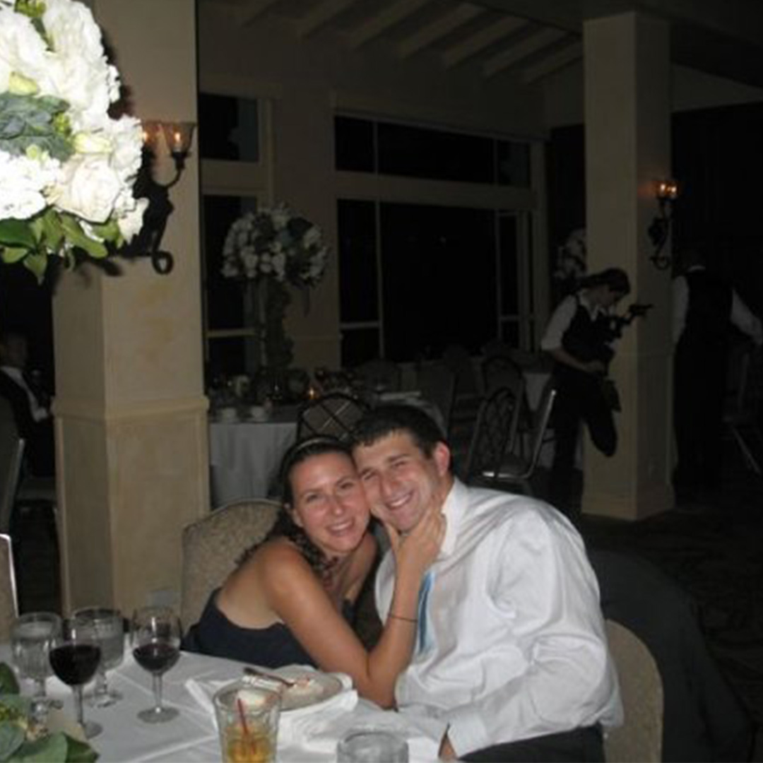 Shana and Adam at a dinner during their WashU days